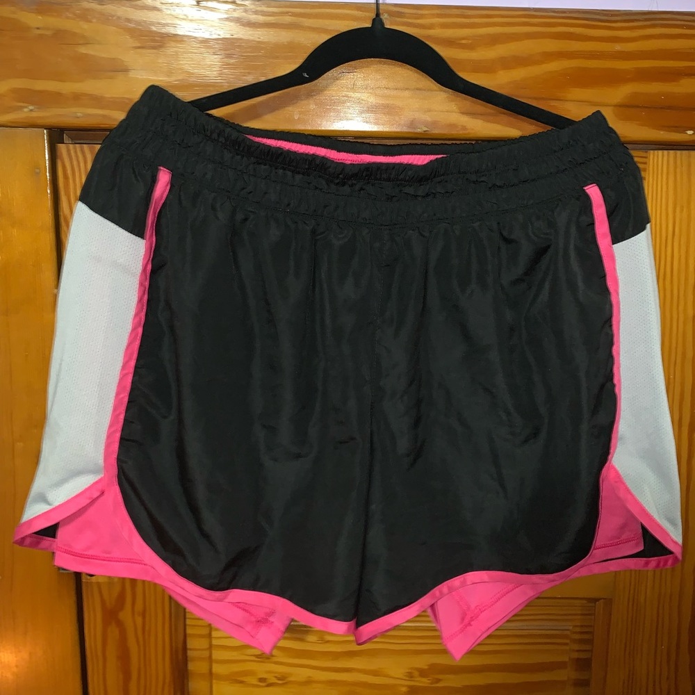 Black and pink workout shorts with built in spandex size XL